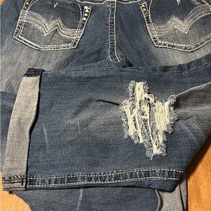 Distressed capri jeans. Vanity size 34 Tyler.
